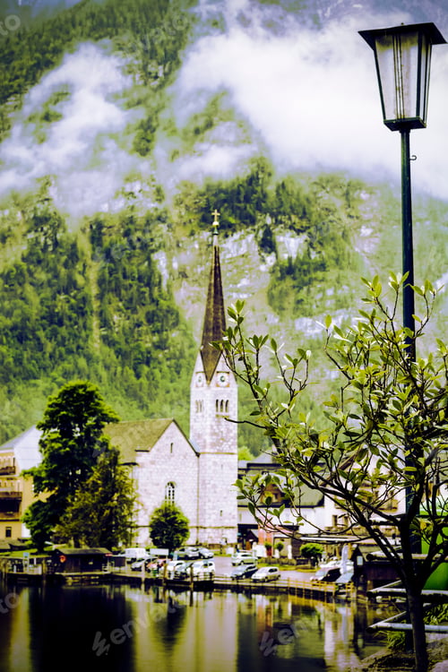 Preview: Neo-Gothic Evangelical Church Located Directly In The Centre Of Hallstatt In Austria. Rain, Morning