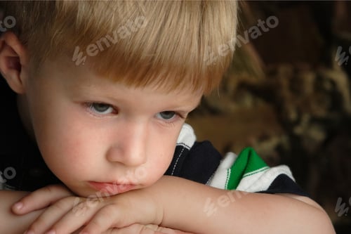 Preview: Portrait Of A Little Boy With Sad Eyes