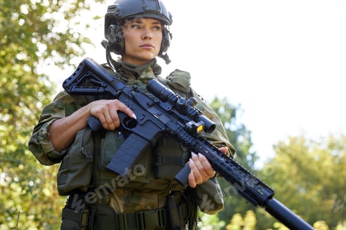 Preview: Brave Caucasian Woman Is Engaged In Hunting Weapon Gun Or Rifle, Wearing Military Suit. Target