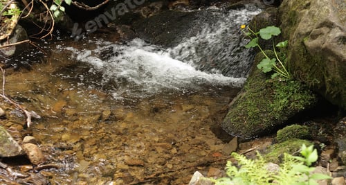 Preview: Beautiful Mountain Water Stream With Small Cascade