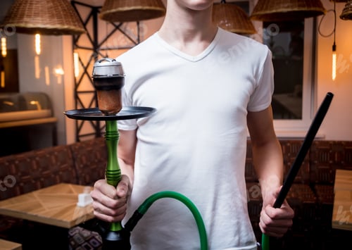 Preview: Cooking Hookah In The Bar. Young Man With Hookah In Restaurant, Hookah Bar, Smoking Cafe.