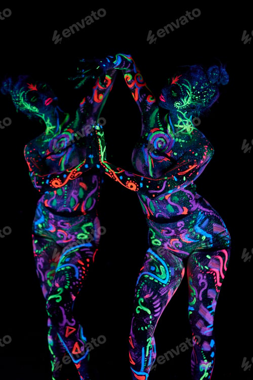 Preview: Art Woman Body Art On The Body Dancing In Ultraviolet Light. Bright Abstract Drawings On The Woman