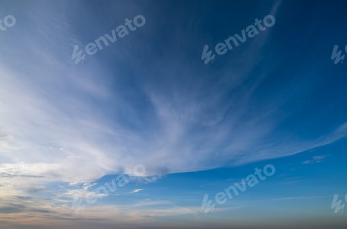 Preview: Fluffy Clouds In Evening Sky View. Climate, Environment And Weather Concept Sky Background.