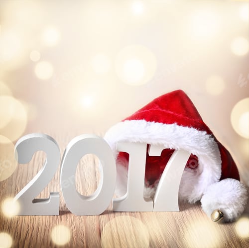 Preview: Santa Hat On A Wooden Background With Figures 2017. Christmas.