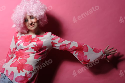 Preview: Portrait Of A Young Girl With Pink Hair Pink Background