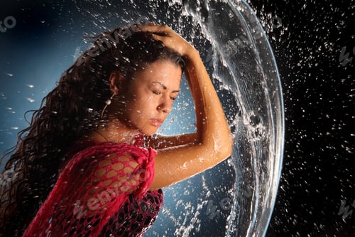 Preview: Beautiful Brunette With Long Hair Plays With Splashes Of Water. Splashes Of Water. Active Movement