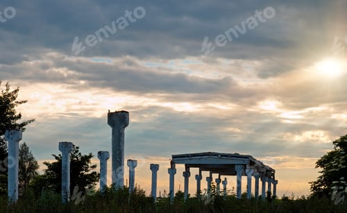Preview: Supports Of Destroyed Farm Building On Twilight Overcast Sky Background (Joyless Sunset)