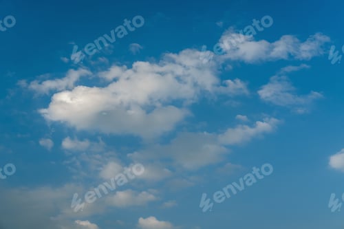 Preview: White Clouds In Blue Azure Sky. Summer Good Weather Background.