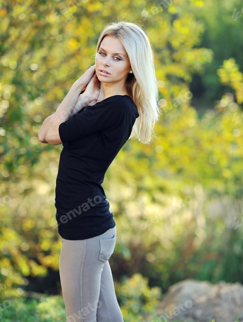 Preview: Beautiful Woman Posing Outdoors with Blond Hair