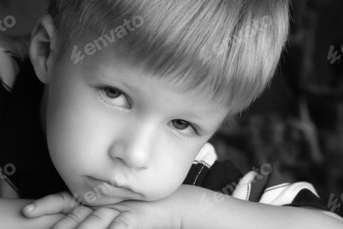 Preview: Portrait Of A Little Boy With Sad Eyes
