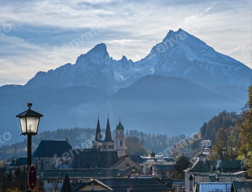 Preview: Autumn Hazy Day Famous Bavarian Prealps Berchtesgaden Town And Mount Watzmann Silhouette In Contra