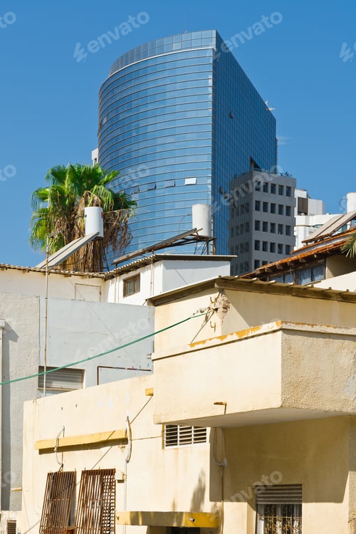 Preview: Old Houses After Reconstruction In Tel Aviv On The Background Of The Modern Building