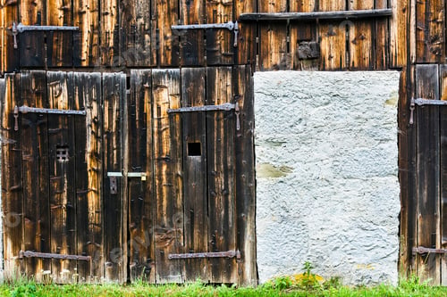 Preview: Traditional Austrian Woode House In Hallstatt. The Old Wood Is Blackened By The Dampness Of The