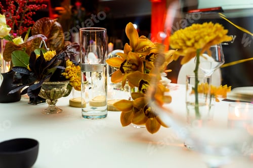 Preview: Candles On A Table Next To Flowers On A Served Table,