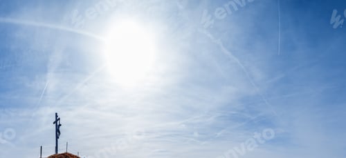 Preview: Christianity Crycifix Religious Jesus Christ Old Wooden Figure On Blue Sky With White Fluffy Cirrus
