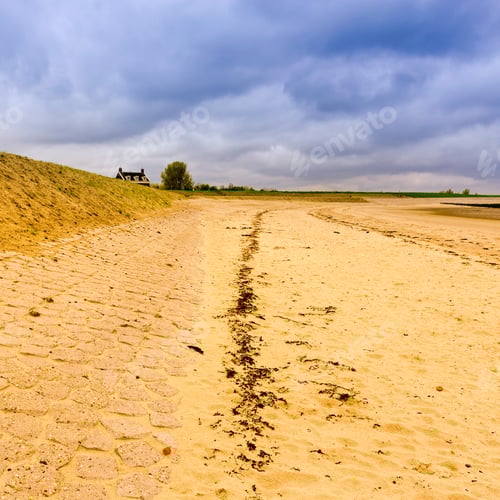 Preview: The North Sea Coast In Zealand, Netherlands. Dutch Landscape With View On The Dike Protects Against