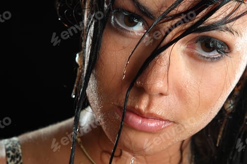 Preview: Portrait Of A Young Woman With Drops Of Water On His Face. Beautiful Makeup, Bright Emotions