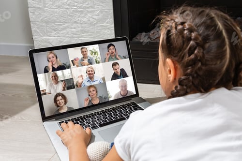 Preview: Girl Looking At Laptop With Videoconference Children Classmates Standing On The Table
