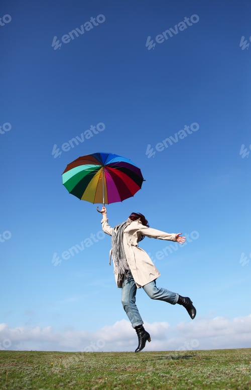 Vista previa: Girl Jumping With Umbrella