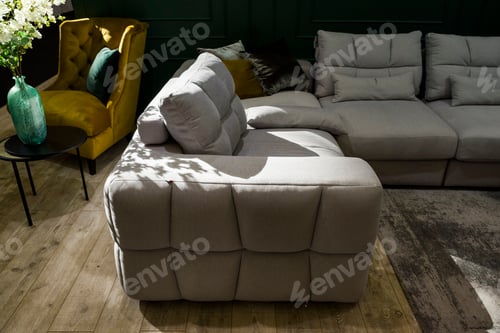 Preview: Armchair And Corner Sofa In The Interior On A Sunny Day