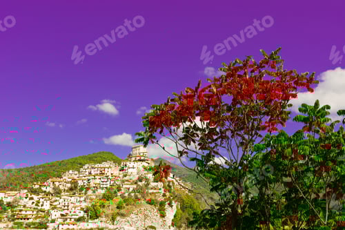 Preview: Red Leaves On The Background Of Medieval Italian City On A Hilltop