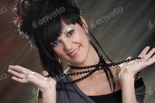 Preview: Portrait Of A Beautiful Girl With Beautiful Makeup And Hair