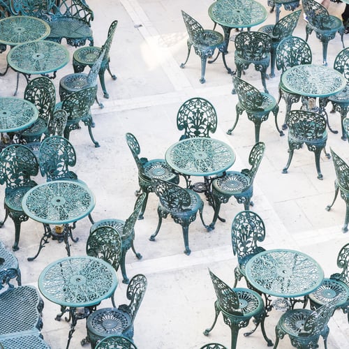 Preview: Openwork Chairs And Tables In A Street Cafe On Malta