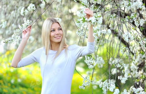 Preview: Portrait Of Beautiful Woman In Blooming Spring Tree