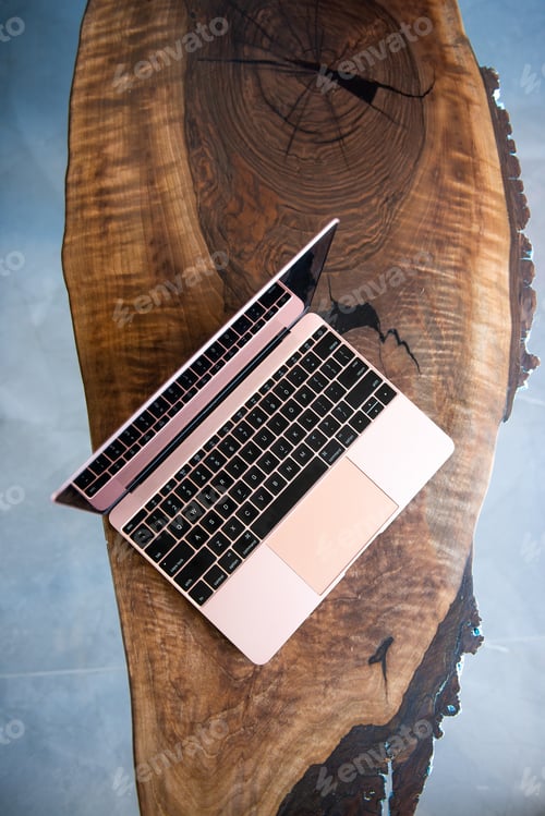 Preview: Pink Laptop On A Beautiful Wooden Table