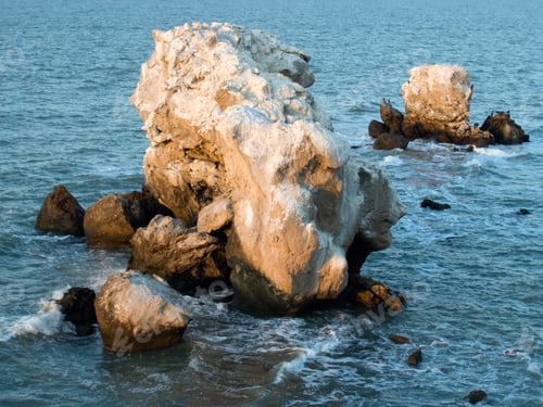 Preview: Rock Between Sea Wave Breaking And Birds On Stones.