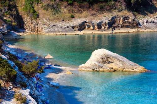 Preview: Summer Morning Pulebardha Beach With Sunbeds And Sunshades (Saranda, Albania). View From Above.