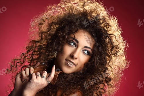 Preview: Beautiful Girl With Curly Hair And Art Make-Up