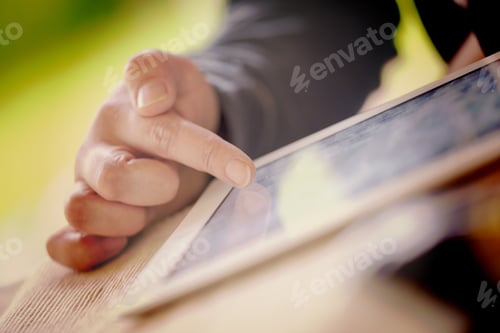 Preview: An Older Man Is Browsing The Internet With A White Tablet Outdoor. Image Has A Vintage Effect