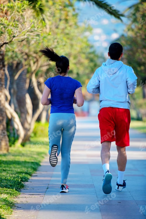 Preview: Urban Sports, Healthy Young Couple Jogging In The City At Sunny Morning