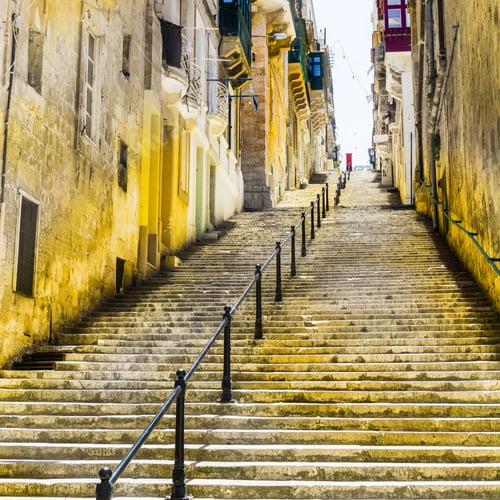 Preview: Typical Narrow Street With Stairs On The Island Of Malta. Buildings With Traditional Colorful