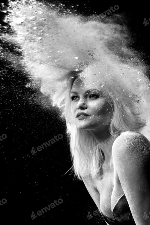 Preview: Blonde On A Black Background In A Large Blast Of White Dust