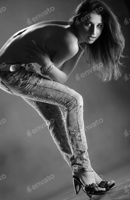 Preview: Active Young Girl With Long Legs On A Blue Background