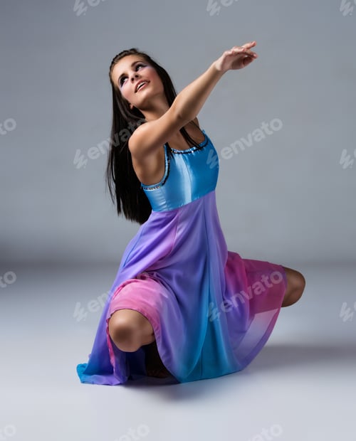 Preview: Beautiful Female Modern Jazz Contemporary Style Dancer On A Grey Background. Dancer Is Barefoot And