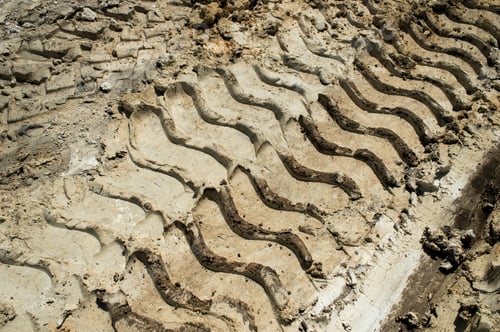Preview: Footprints In The Clay From The Tractor Wheels