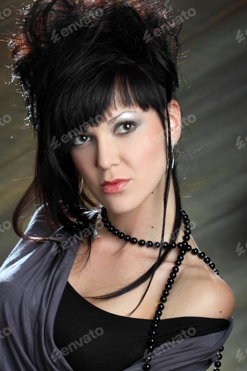 Preview: Portrait Of A Beautiful Girl With Curly Hair In Studio Shooting