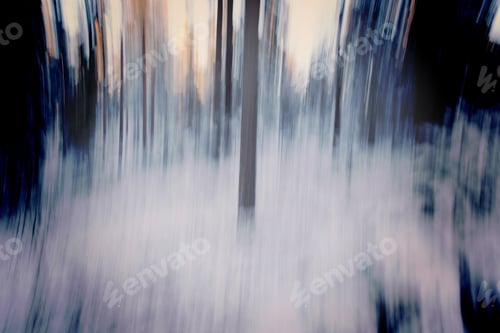 Preview: Wintry Forest Blurred. Motion Blur Made By Moving The Camera Vertically. Image Has A Vintage Effect