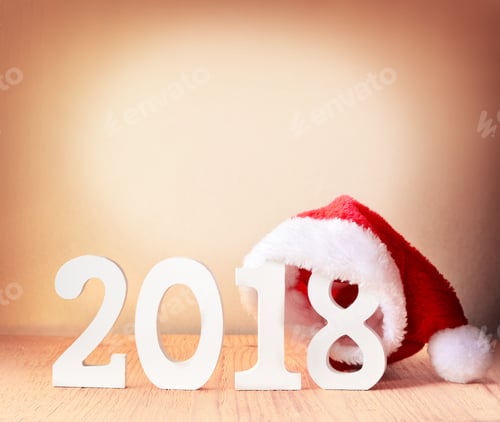 Preview: Santa Fur Cap On A Rustic Wooden Background With Figures 2018
