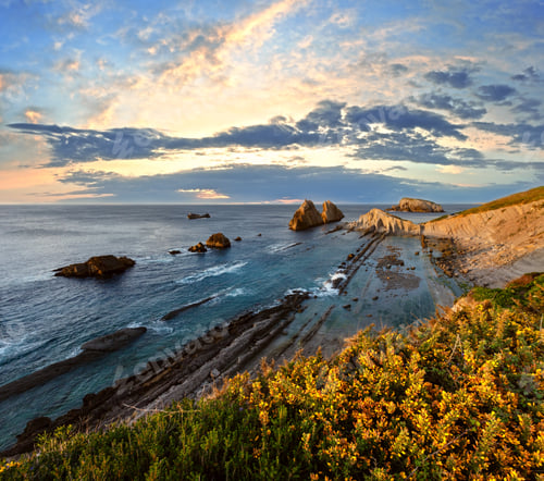 Preview: Blossoming Sunset Arnia Beach, Spain. Atlantic Ocean Evening Coastline Landscape.