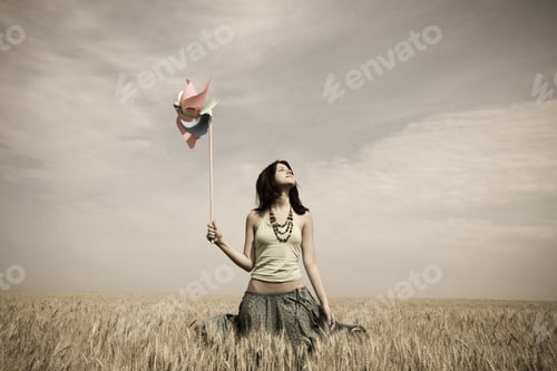 Preview: Girl With Toy Wind Turbine At Field, Photo In Age Style