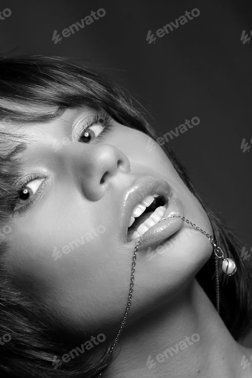 Preview: Portrait Of A Young Girl With Decoration In The Lips