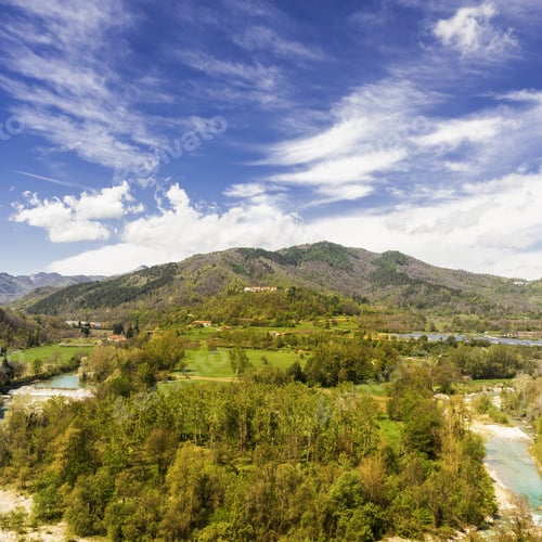 Preview: Bend Of The River At The Foothills Of Italian Alps In Piedmont. Landscape On The Background Of Of