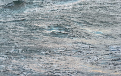 Preview: Evening Sea Waving Surface With Blue (Sky) Reflections And Yellow (Evening Sun)