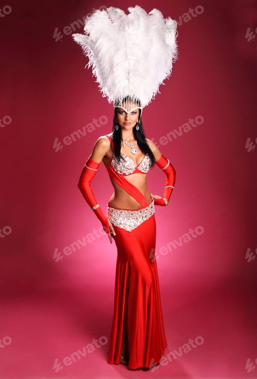 Preview: Beautiful Woman In Red Carnival Costume With Large Fluffy White Feathers