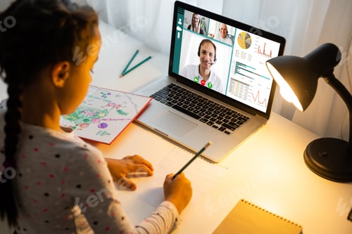 Preview: Girl Attends Class Remotely On Laptop At Home