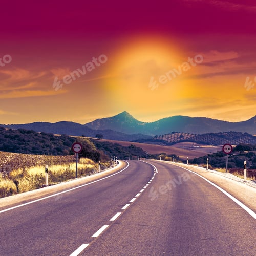 Preview: Asphalt Road Between Fields In Spain After Harvesting At Sunrise. Breathtaking Landscape And Nature